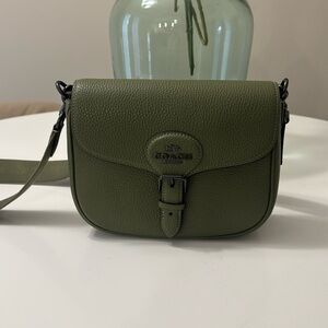 Never carried, brand new coach cross body bag!